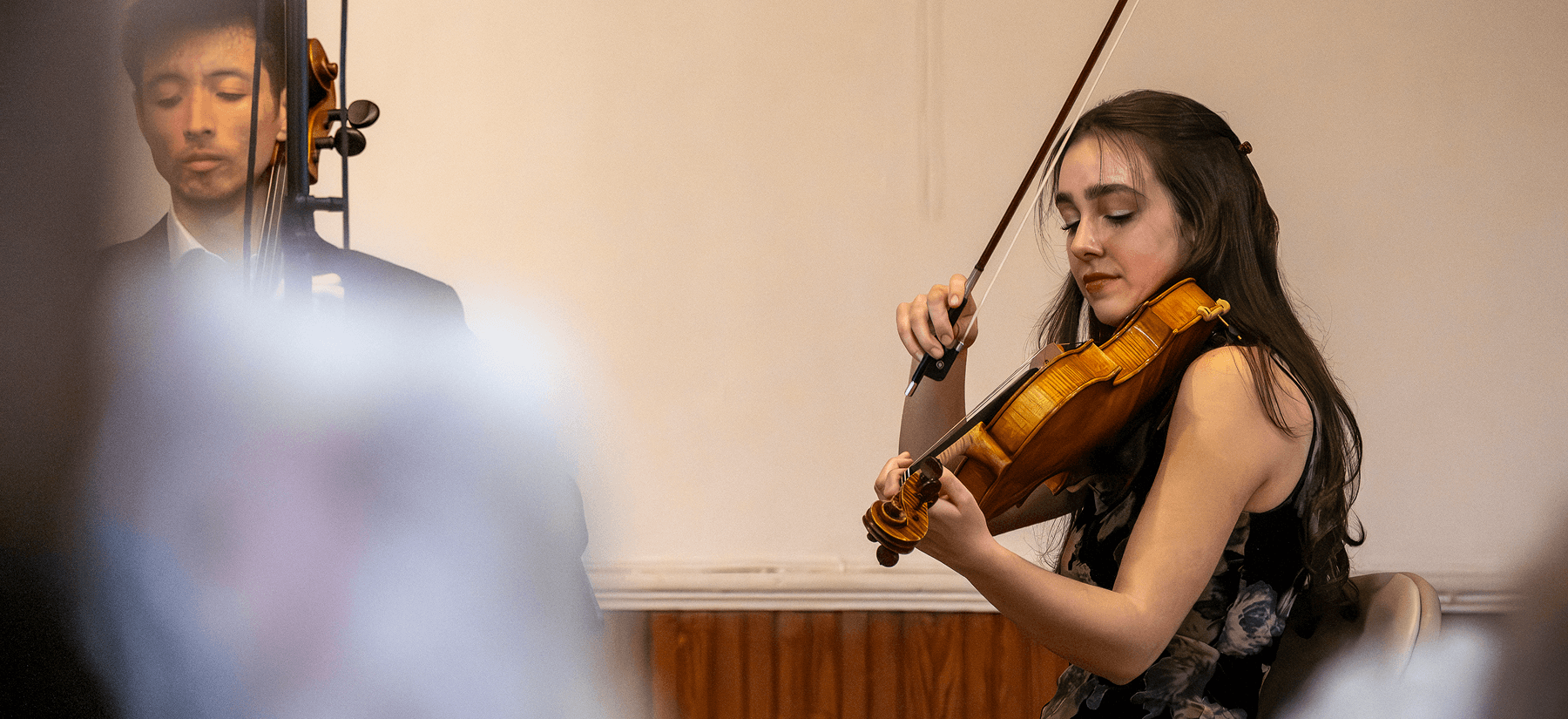 woman playing a musical instrument